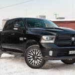 Motor Hills | Why Are Pickup Trucks So Big? 12 Common Reasons Black Dodge RAM in parking lot with snow
