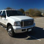 Motor Hills | Why Do People Leave Diesel Trucks Running? Ford F-350 F350 Pickup Truck Diesel parked in a parking lot