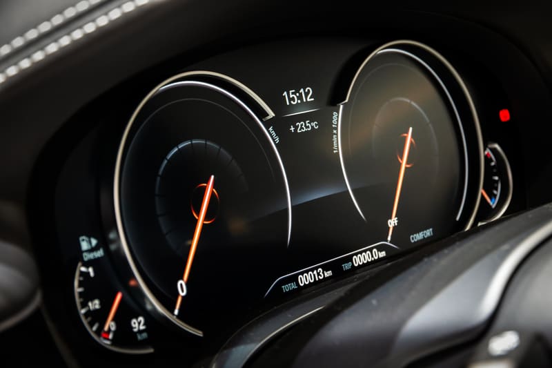 Motor Hills | 15 Reasons Why Luxury Cars Are So Expensive Digital dashboard instrument cluster of a BMW 7-Series in Geneva, Switzerland 88th Geneva International Motor Show