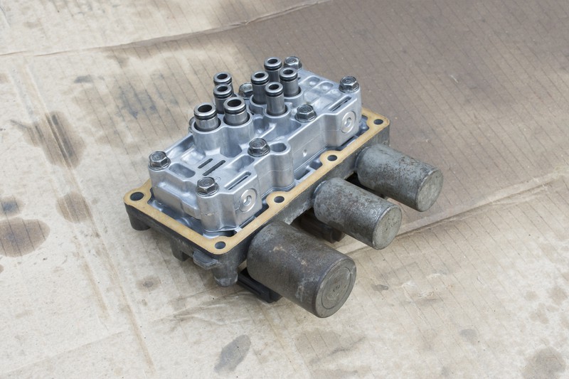 Close up of a valve body that goes inside the automatic transmission with the solenoids installed