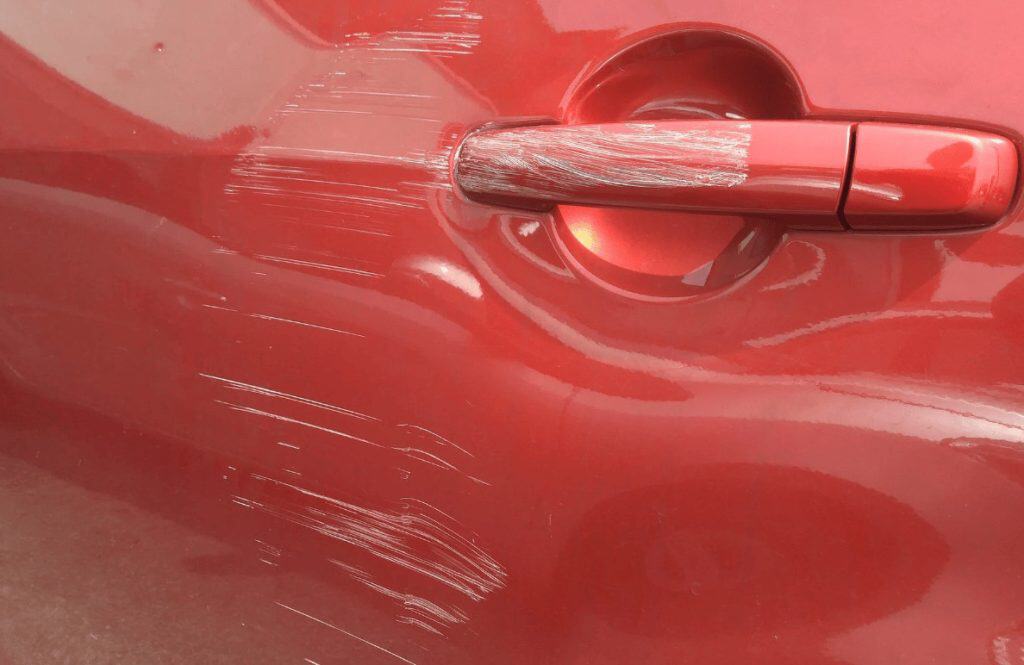 Motor Hills | Recognizing 3 Car Theft Warning Signs to Protect Your Vehicle car scratch due to car theft