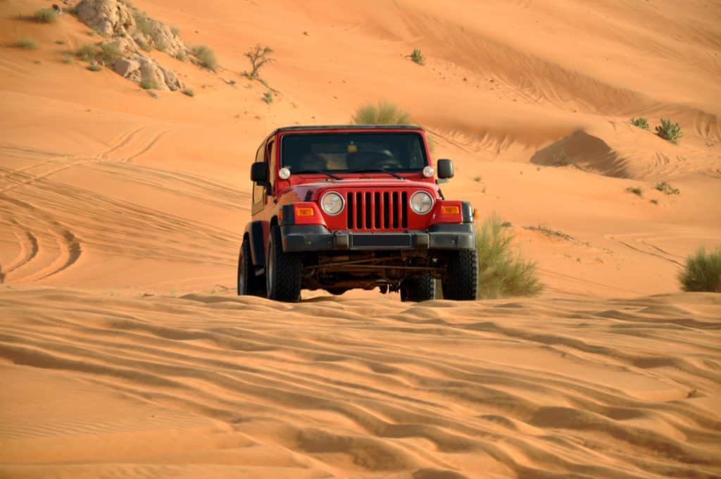 Motor Hills | 8 Essential Jeep Accessories for Off-Road Adventures Jeep on Desert - Jeep Accessories